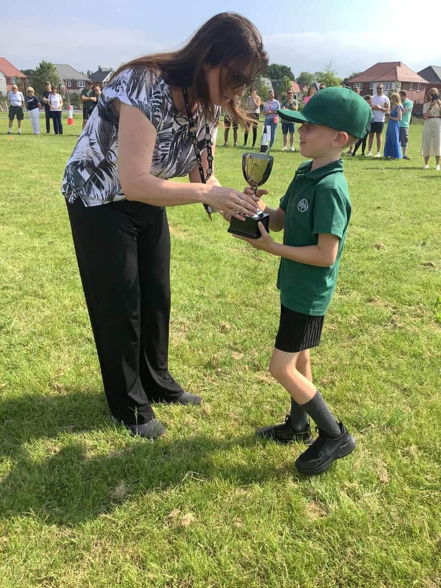 Pupil getting trophy